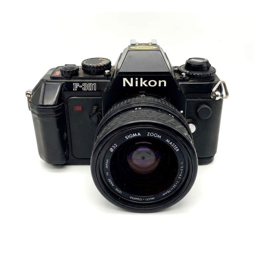 Nikon 301 sigma zoom - +,