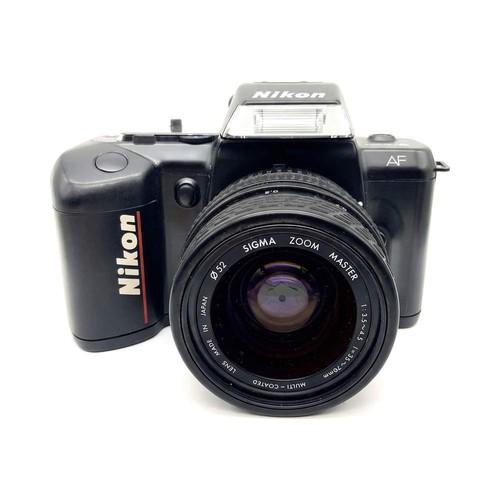 Nikon 401 sigma zoom - +,